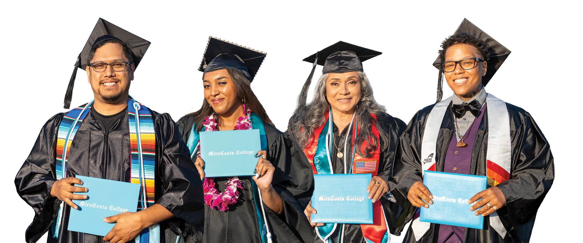 MiraCosta College graduates holding diplomas